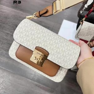 MICHAELL KORSS SOLAN EDITOR SLING BAGS