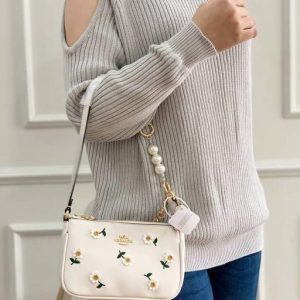 COACHH LATEST EDITION SLING