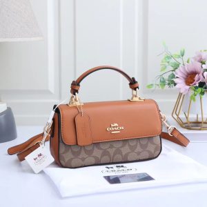 LATEST COACHE SLING