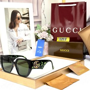 GUCCIS