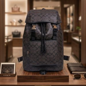 MODEL:- *COACHE Coffee Brown Monogram Premium Qulality Big Size Bagpack